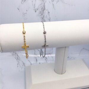 Dainty sideways cross and bezel set cz bracelet.